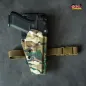 Preview: Professionelles GM ALPHA OWB Kydex Holster von Gear Maniacs in Multicam für Glock 34, montiert auf einem Blade-Tech Duty Drop and Offset System inklusive elastischem Beingurt.